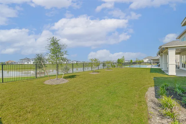 a view of a lake with houses