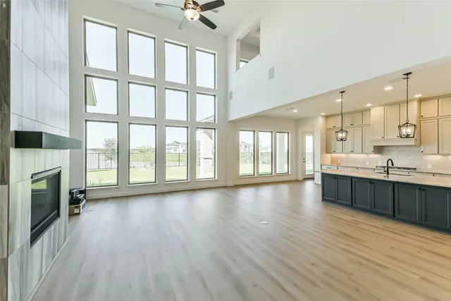 a large living room with a large window