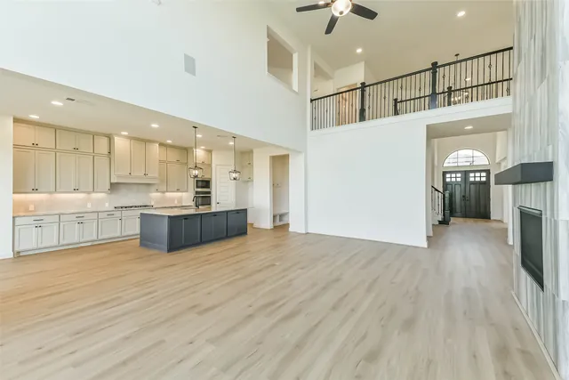 a view of kitchen and kitchen with a sink