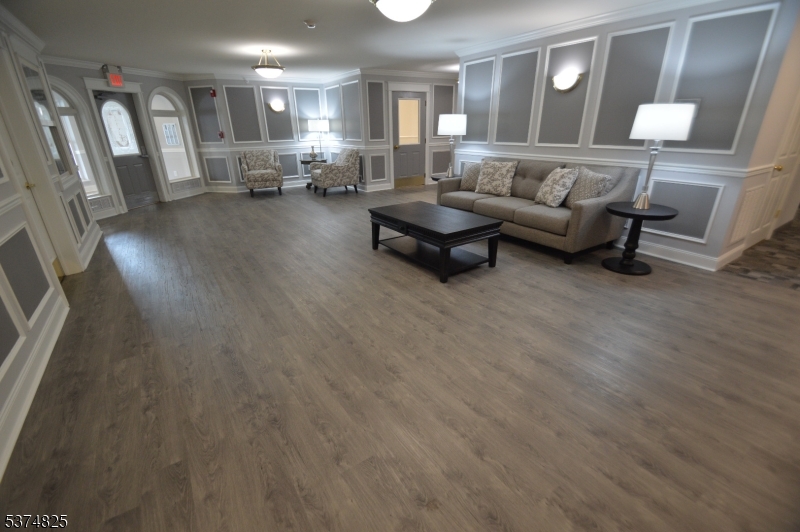 1 Jenny Lind Street, Unit 11 Netcong, NJ 07857 - Photo 3 of 24 a living room with furniture and a wooden floor