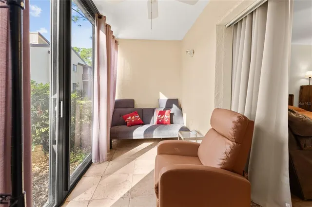a living room with furniture and a window