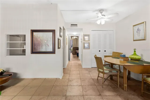 a view of a dining room with furniture