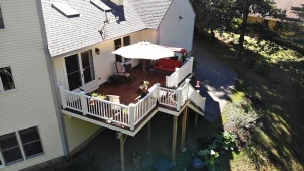 95 Stonefence Road Lunenburg, MA 01462 - Photo 11 of 41 a balcony with table and chairs