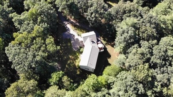 95 Stonefence Road Lunenburg, MA 01462 - Photo 2 of 41 an aerial view of a house with a yard and trees
