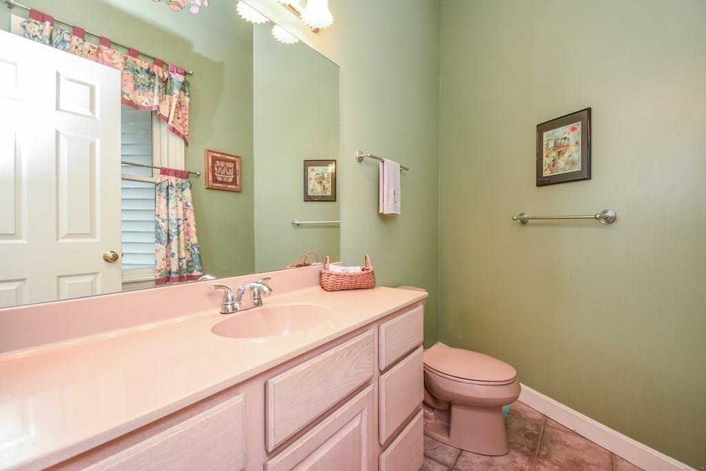 95 Stonefence Road Lunenburg, MA 01462 - Photo 22 of 41 a bathroom with a sink a toilet and shower