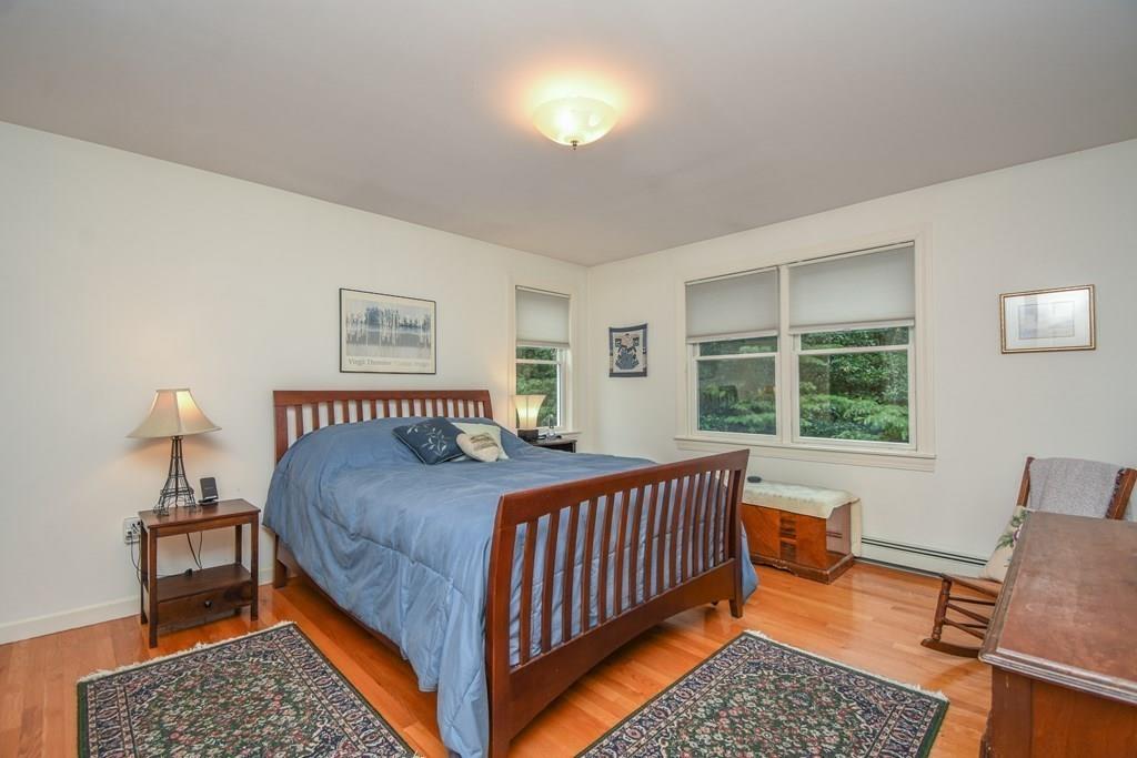 95 Stonefence Road Lunenburg, MA 01462 - Photo 24 of 41 a bedroom with a bed and window