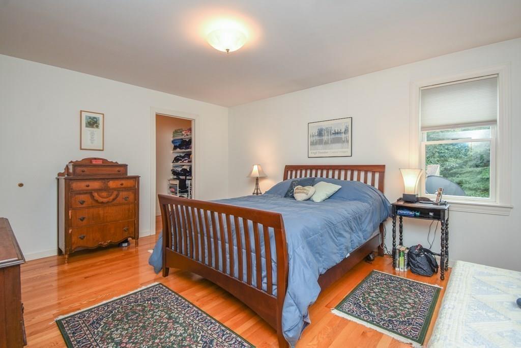 95 Stonefence Road Lunenburg, MA 01462 - Photo 25 of 41 a bedroom with a bed and a window