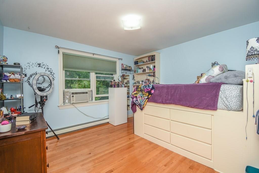 95 Stonefence Road Lunenburg, MA 01462 - Photo 28 of 41 a bed room with a bed and a window
