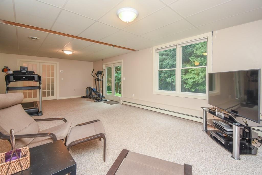95 Stonefence Road Lunenburg, MA 01462 - Photo 33 of 41 a room with furniture and a window
