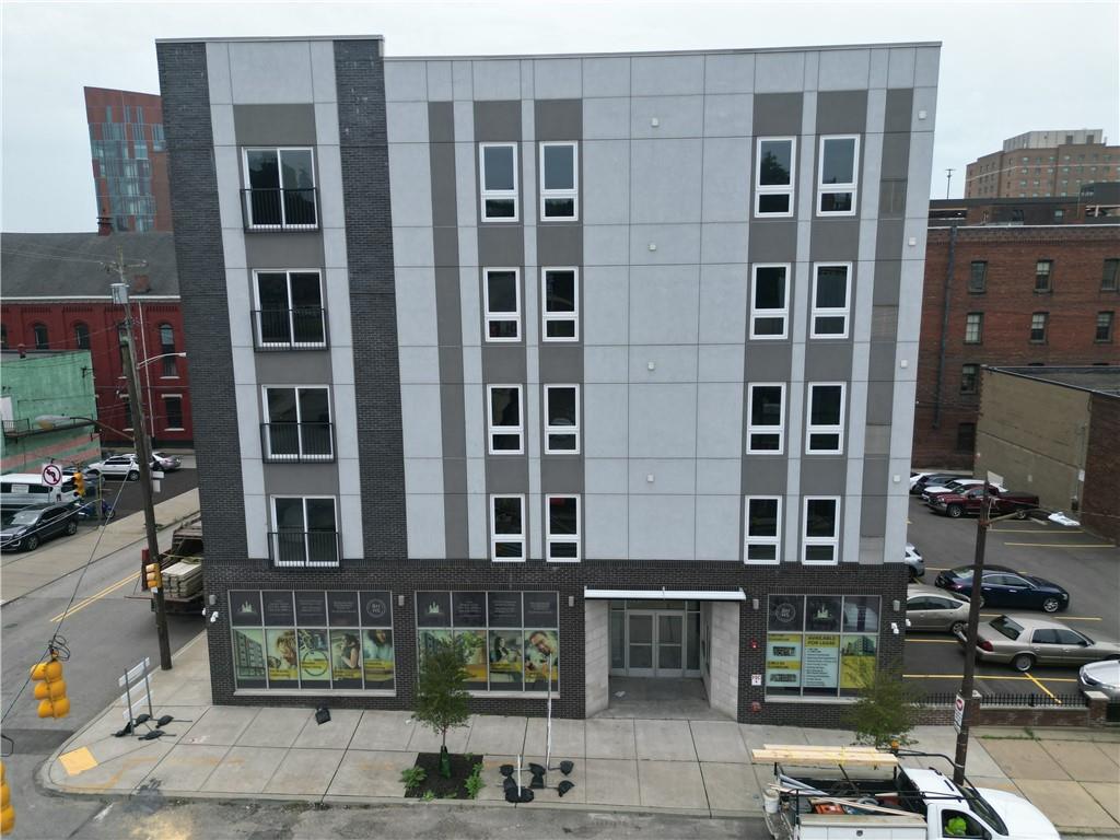 1450 Fifth Avenue, Unit 202 Pittsburgh, PA 15219 - Photo 3 of 20 a front view of a building with street view