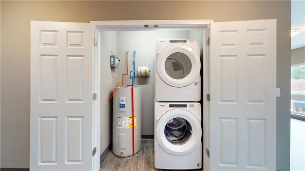 a utility room with dryer and washer
