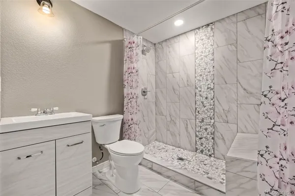 $575,000 | 6271 North Genoa Way, Aurora, CO 80019