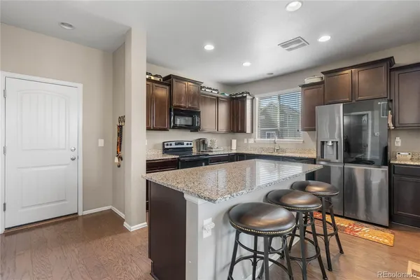 $575,000 | 6271 North Genoa Way, Aurora, CO 80019