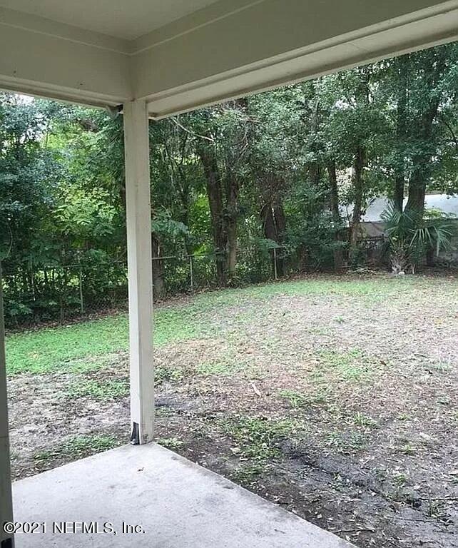 2346 Somerset Road Jacksonville, FL 32210 - Photo 21 of 23 a view of a yard with a tree