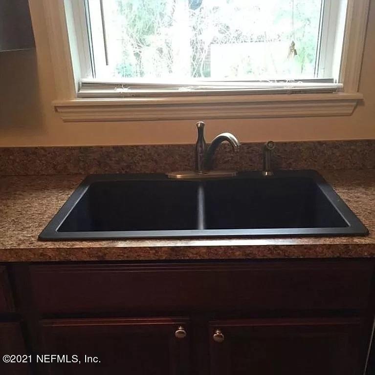 2346 Somerset Road Jacksonville, FL 32210 - Photo 5 of 23 a close view of sink and microwave