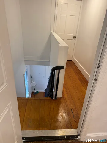 a view of dining room with wooden floor