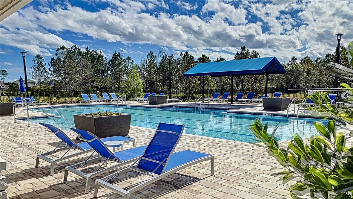 93015 Cope Court Fernandina Beach, FL 32034 - Photo 11 of 23 a view of a swimming pool with a patio