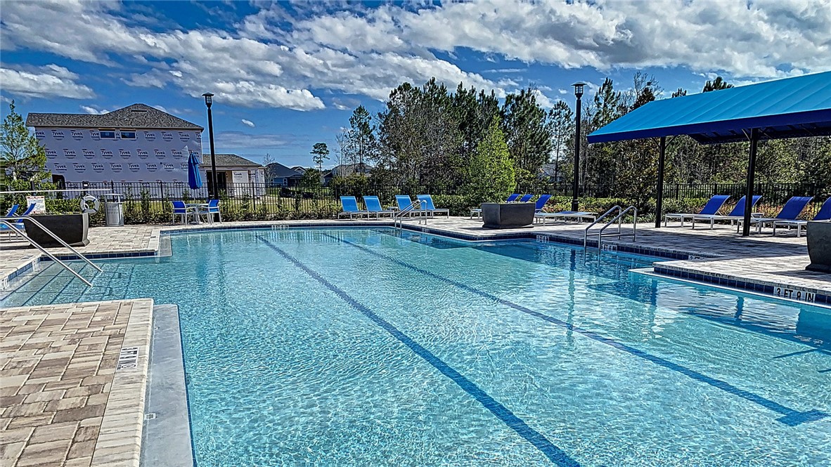 93015 Cope Court Fernandina Beach, FL 32034 - Photo 19 of 23 a view of a swimming pool with a patio