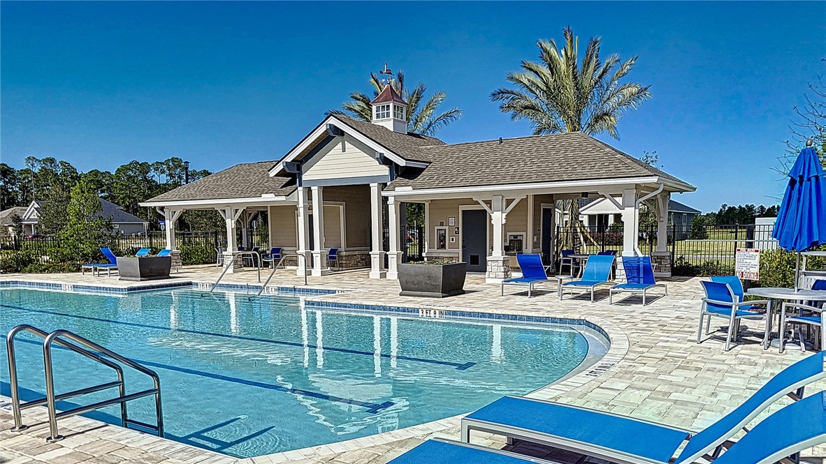 93015 Cope Court Fernandina Beach, FL 32034 - Photo 21 of 23 a view of a house with swimming pool and sitting area