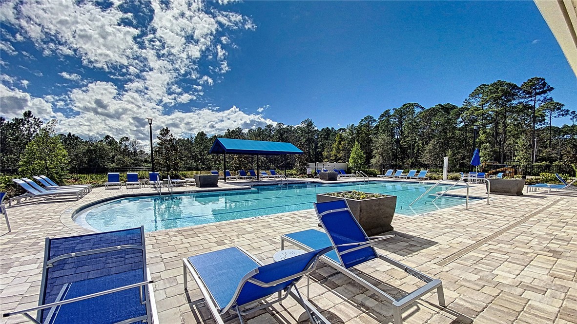 93015 Cope Court Fernandina Beach, FL 32034 - Photo 23 of 23 a view of swimming pool with seating space