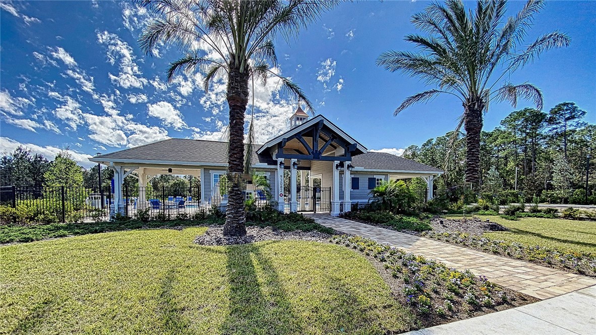 93015 Cope Court Fernandina Beach, FL 32034 - Photo 6 of 23 a house view with a garden space