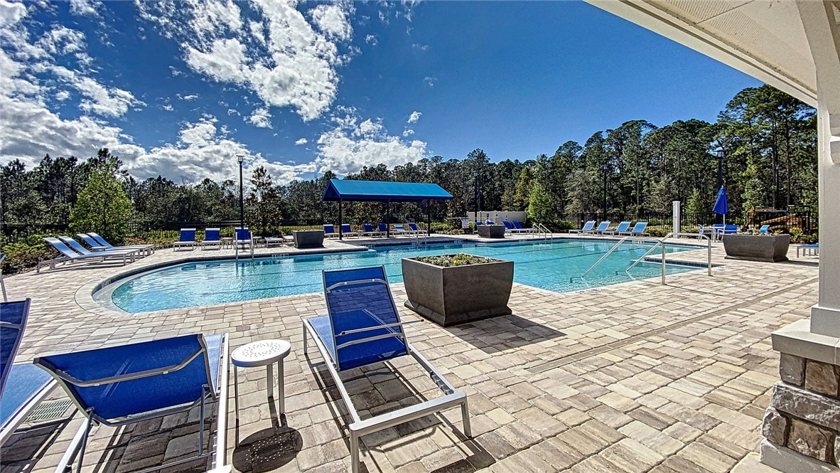 93015 Cope Court Fernandina Beach, FL 32034 - Photo 9 of 23 a view of a swimming pool with a patio