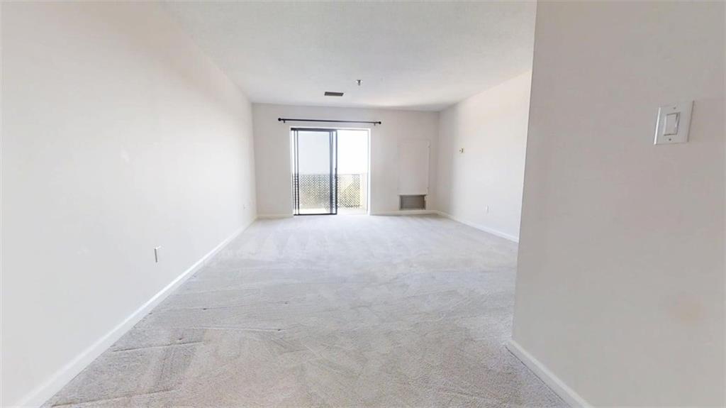 300 Johnson Ferry Road, Unit B805 Sandy Springs, GA 30328 - Photo 13 of 31 a view of an empty room with a window