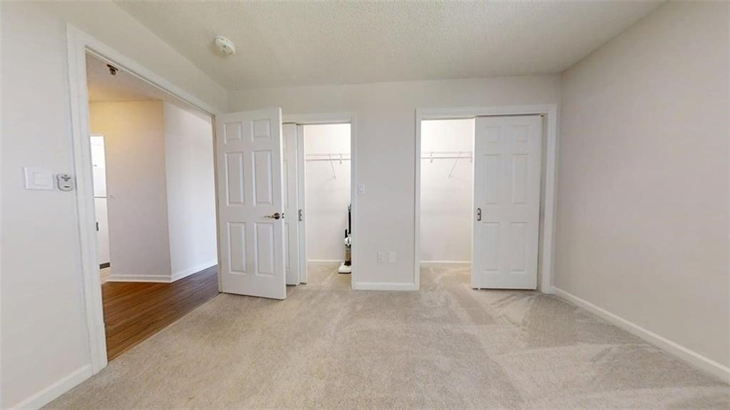 300 Johnson Ferry Road, Unit B805 Sandy Springs, GA 30328 - Photo 22 of 31 an empty room with closet