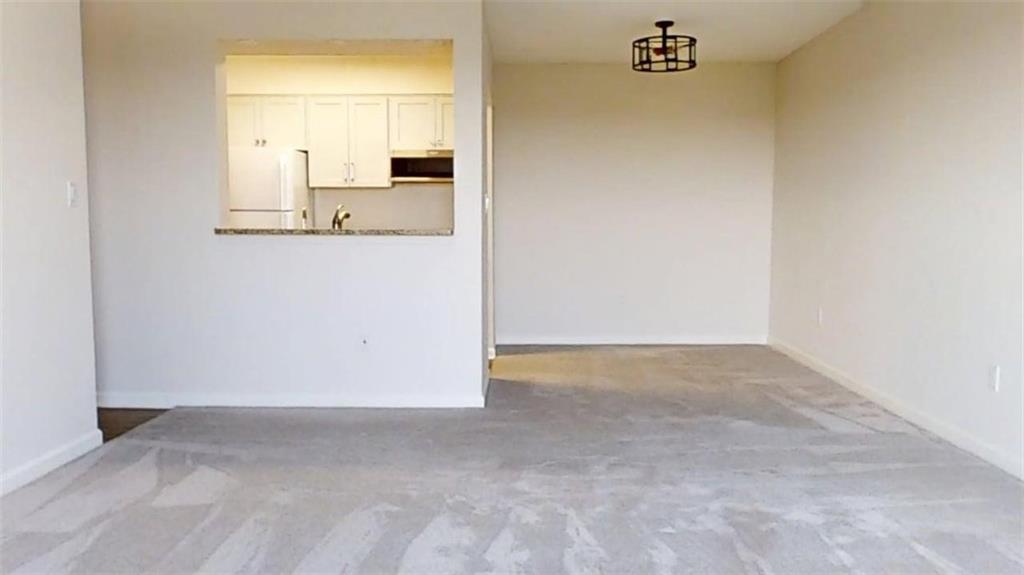 300 Johnson Ferry Road, Unit B805 Sandy Springs, GA 30328 - Photo 10 of 31 view of a room with a sink and mirror