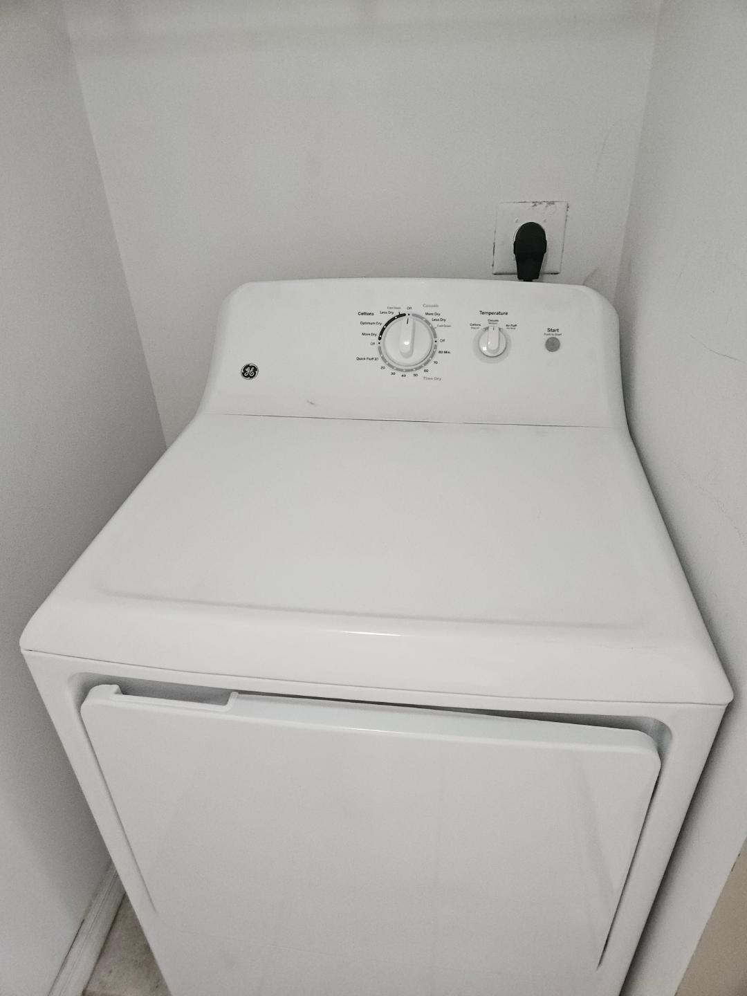 5011 Wiles Road, Unit 308 Coconut Creek, FL 33073 - Photo 11 of 12 a close up view of washer and dryer