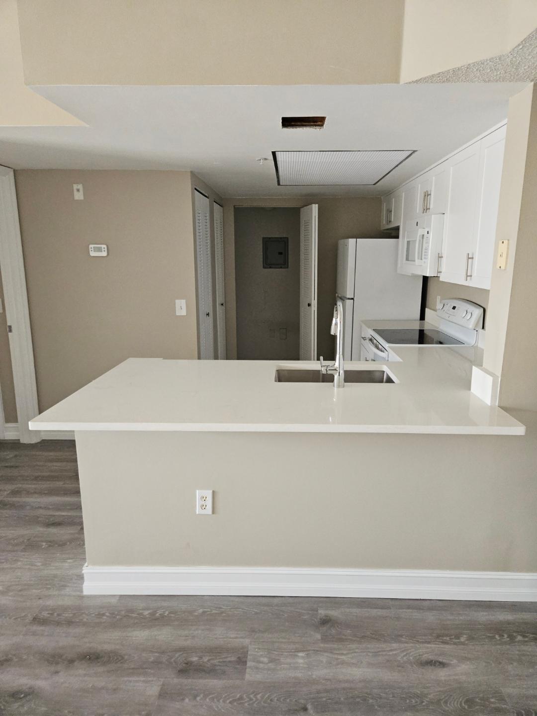 5011 Wiles Road, Unit 308 Coconut Creek, FL 33073 - Photo 6 of 12 a view of reception area