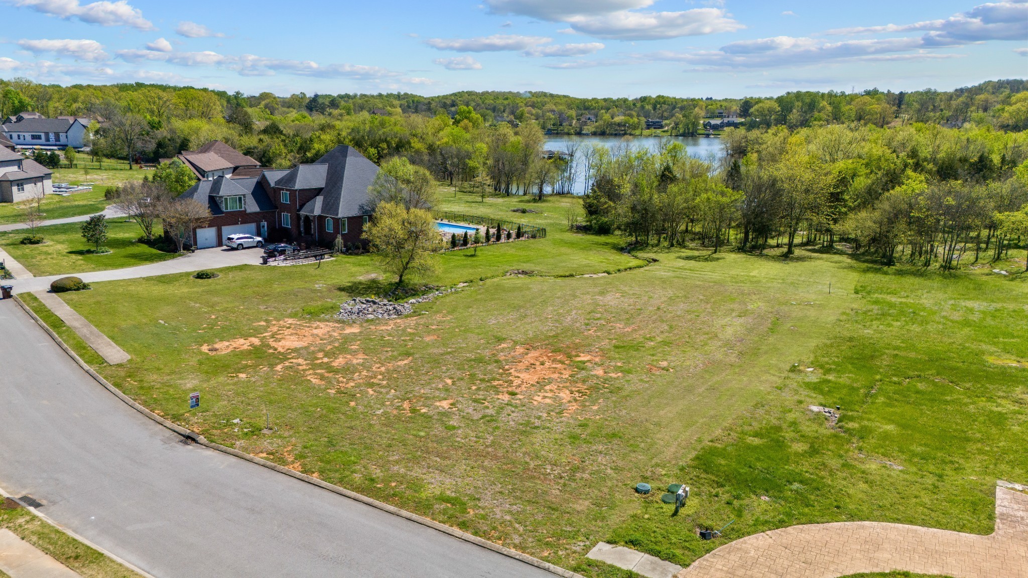 304 Stonebrook Point Lebanon, TN 37087 - Photo 3 of 8 a view of a lake with a mountain