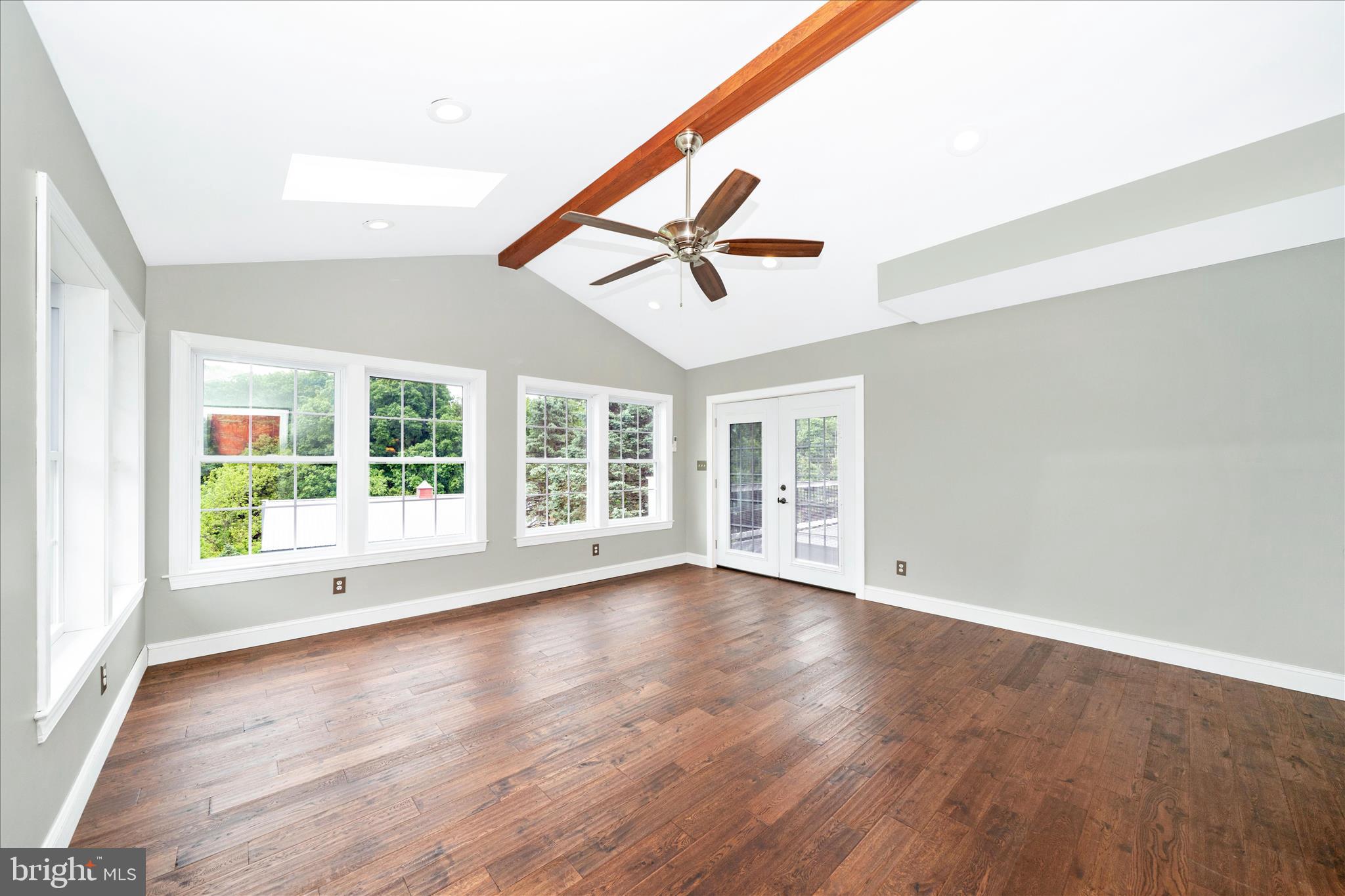 3204 Hooper Road New Windsor, MD 21776 - Photo 25 of 63 Great Room w/Atrium Door to Deck & Stairs to Yard