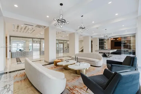 a view of a lobby with gym equipment