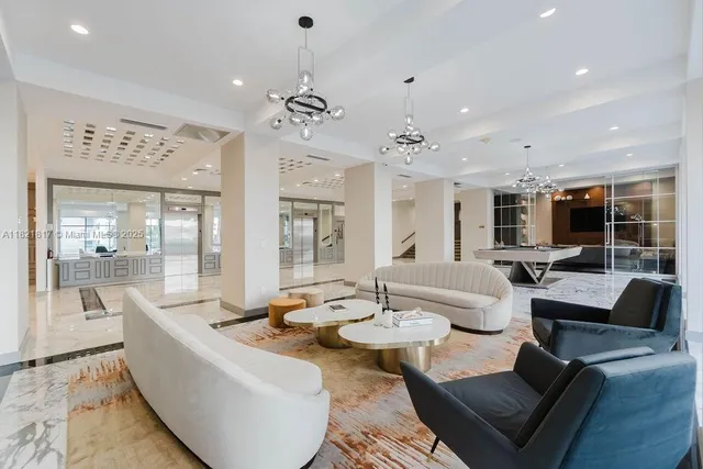 a view of a lobby with gym equipment