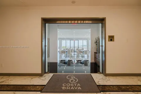 a view of balcony with wooden floor