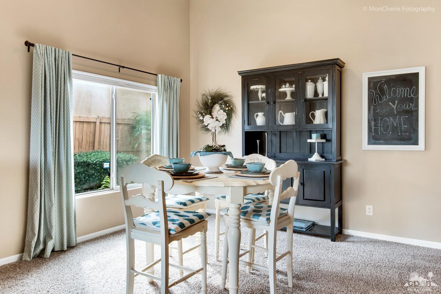 41675 Front Hall Road Bermuda Dunes, CA 92203 - Photo 13 of 23 a view of a dining room with furniture window and outside view