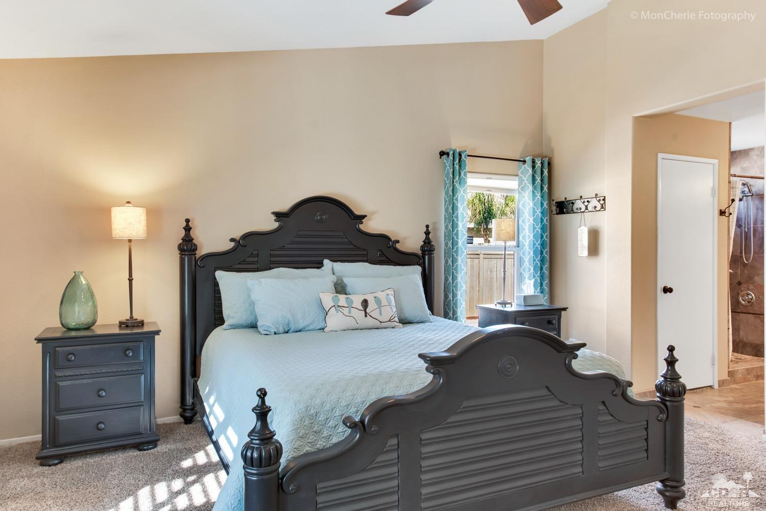 41675 Front Hall Road Bermuda Dunes, CA 92203 - Photo 14 of 23 a bedroom with a bed and wooden floor