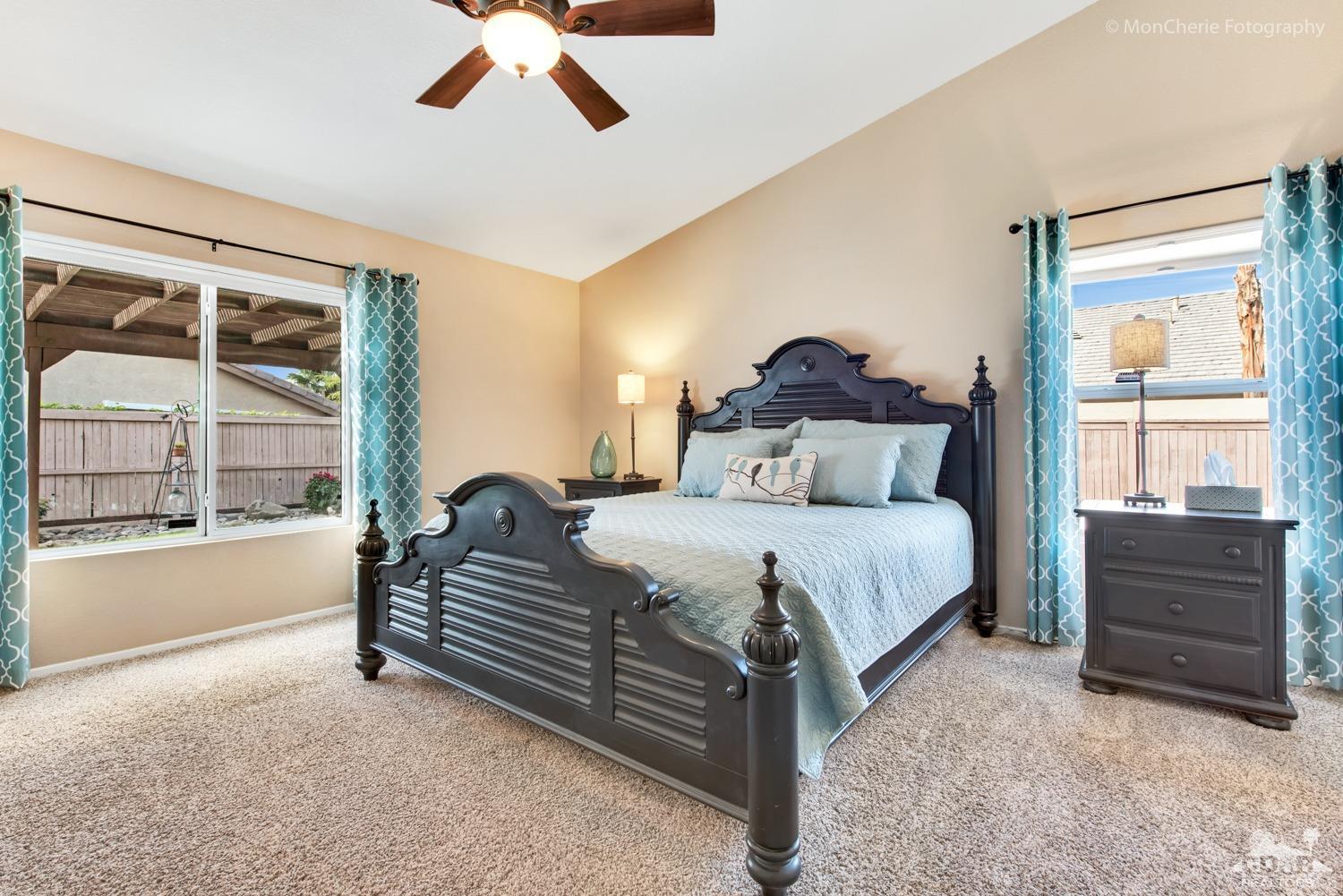 41675 Front Hall Road Bermuda Dunes, CA 92203 - Photo 3 of 23 a bedroom with a bed and a large window