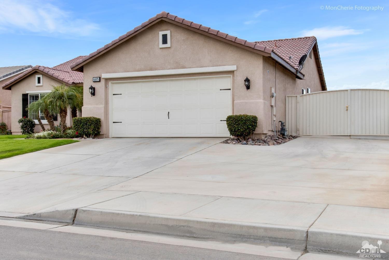 41675 Front Hall Road Bermuda Dunes, CA 92203 - Photo 23 of 23 a view of a house with a yard
