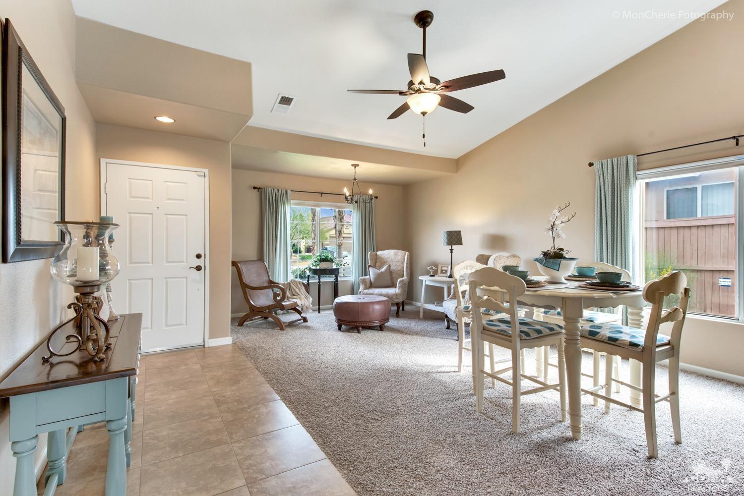 41675 Front Hall Road Bermuda Dunes, CA 92203 - Photo 4 of 23 a living room with furniture and a large window