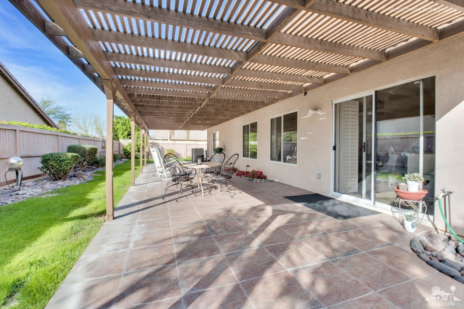 41675 Front Hall Road Bermuda Dunes, CA 92203 - Photo 5 of 23 a view of a backyard of the house