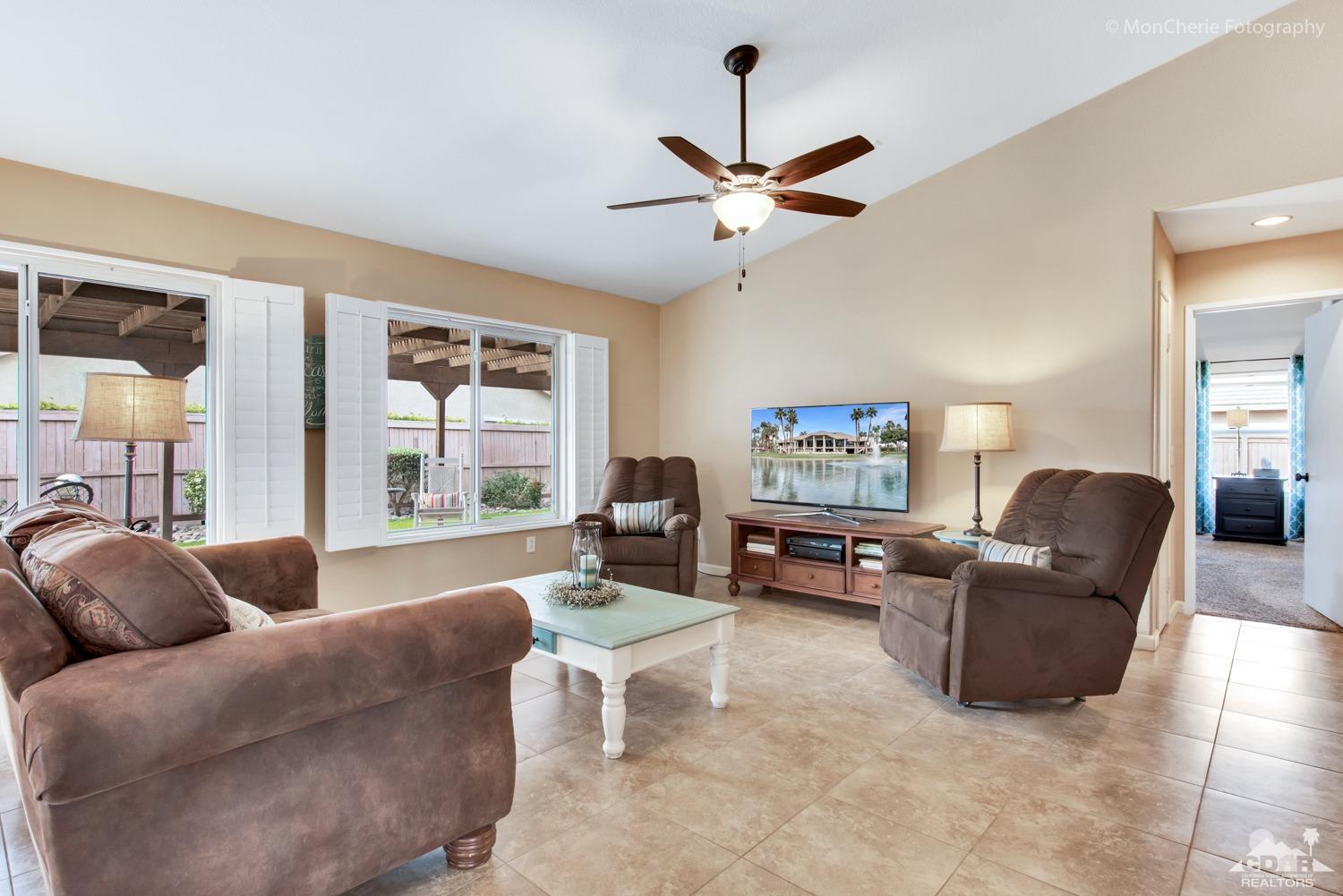 41675 Front Hall Road Bermuda Dunes, CA 92203 - Photo 8 of 23 a living room with furniture and a large window