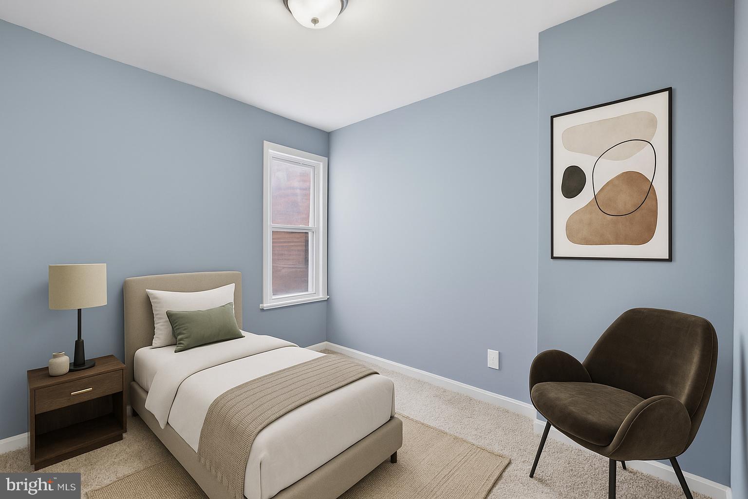 1919 Mosher Street Baltimore, MD 21217 - Photo 13 of 21 a bedroom with a bed and chair