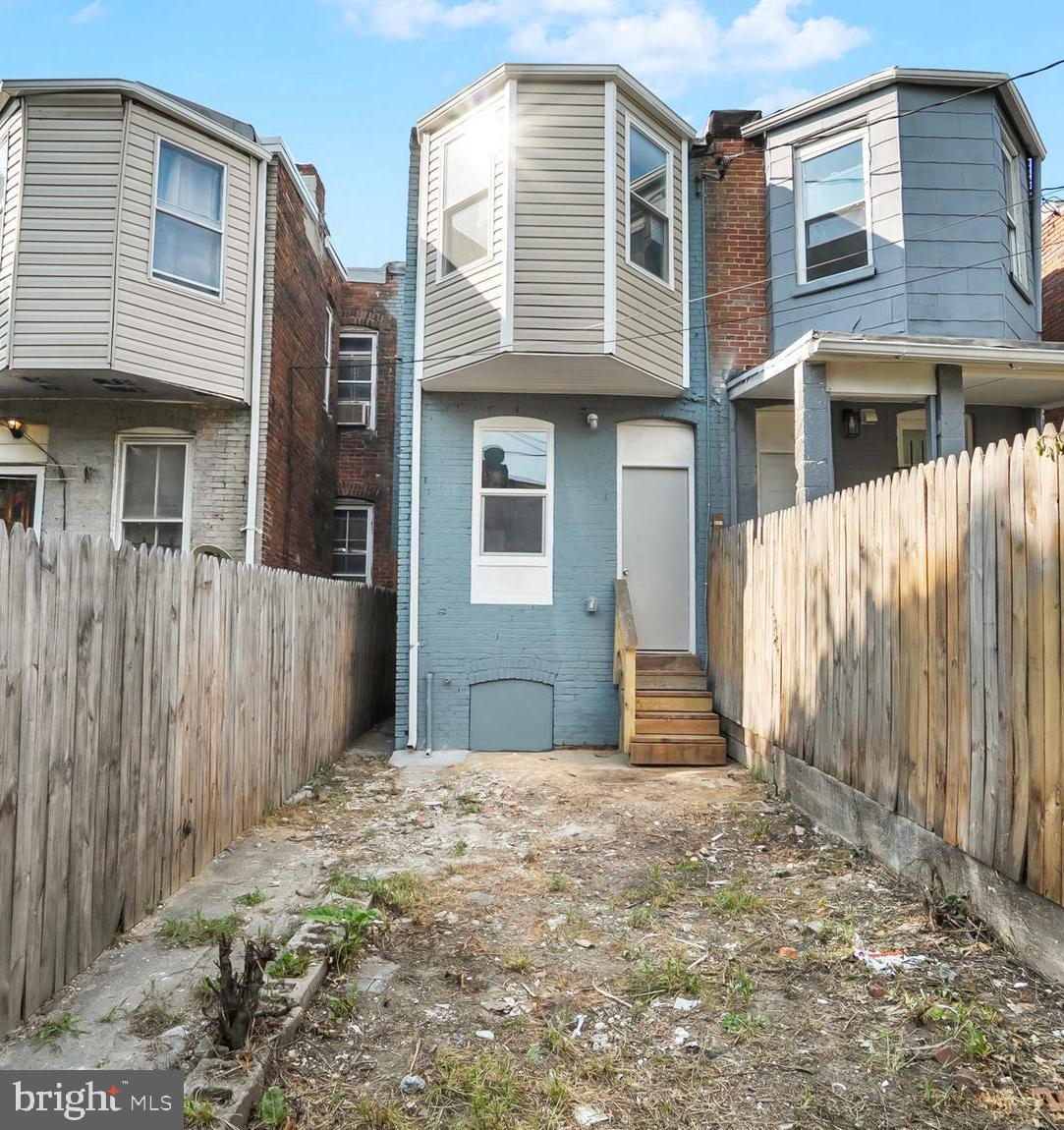 1919 Mosher Street Baltimore, MD 21217 - Photo 20 of 21 a front view of a house with a yard