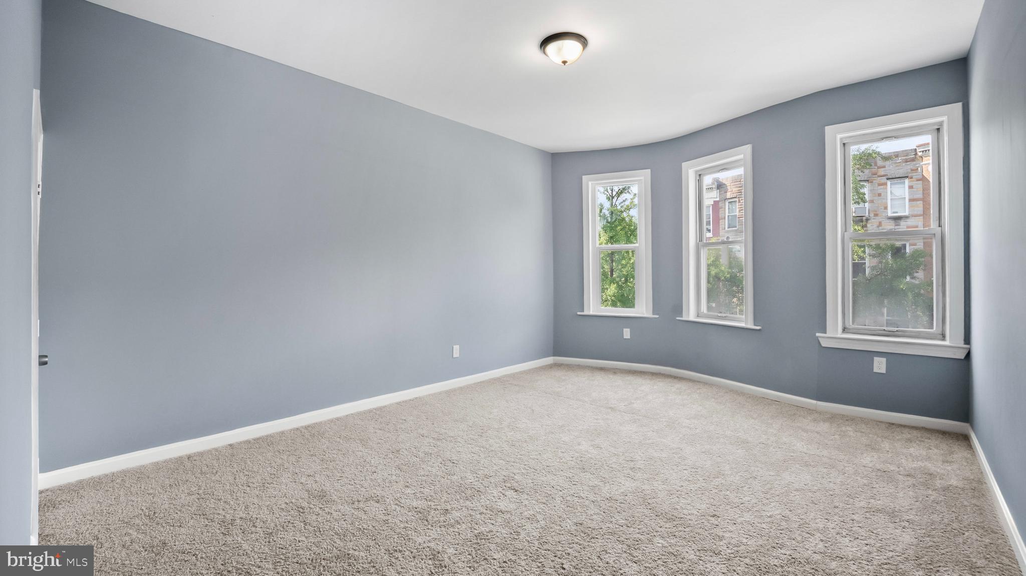 1919 Mosher Street Baltimore, MD 21217 - Photo 10 of 21 an empty room with windows