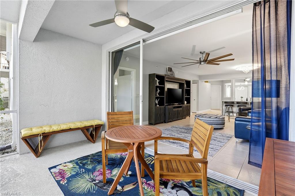 4950 Deerfield Way, Unit 103 Naples, FL 34110 - Photo 25 of 39 a outdoor space with furniture