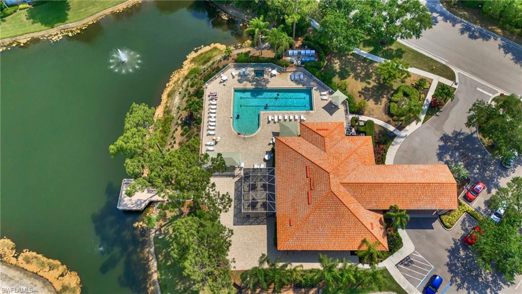 4950 Deerfield Way, Unit 103 Naples, FL 34110 - Photo 34 of 39 an aerial view of a house with outdoor space swimming pool and outdoor seating