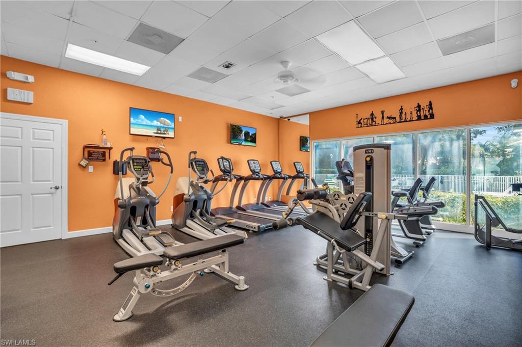 4950 Deerfield Way, Unit 103 Naples, FL 34110 - Photo 37 of 39 a view of a room with gym equipment