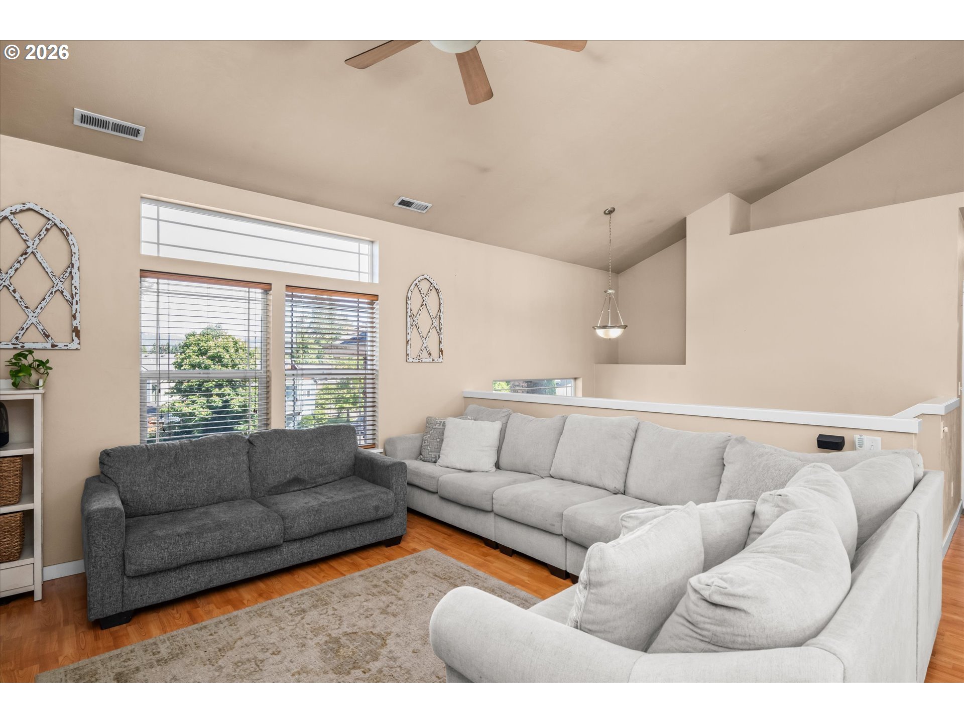 277 South 67th Court Springfield, OR 97478 - Photo 7 of 44 a living room with furniture and a large window